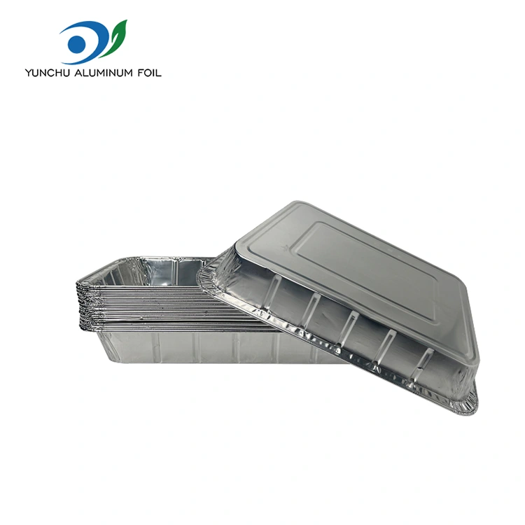 Великі контейнери з алюмінієвої фольги на грилі на грилі